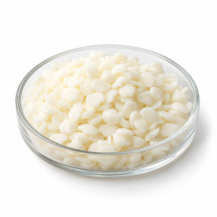 Illustration of Glyceryl Stearate and PEG-100 Stearate ivory pastilles in a glass dish