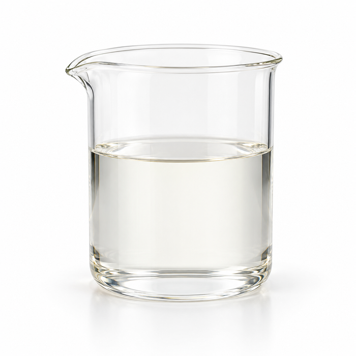 Clear Lanol 37T triheptanoin emollient in a glass laboratory beaker on white