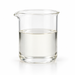 Clear Lanol 37T triheptanoin emollient in a glass laboratory beaker on white