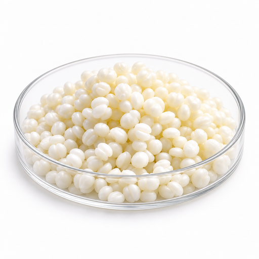 Ivory-white Symbiomuls GC MB emulsifier granules in a clear glass Petri dish on white